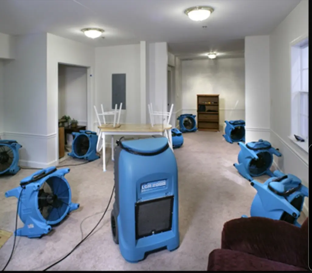 Air movers and dehumidifier setup for Water Damage Restoration in La Grange